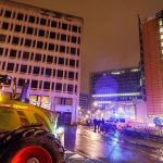 Brussels: Farmers protest near the EC headquarters.  They set tires on fire and the police used water cannons